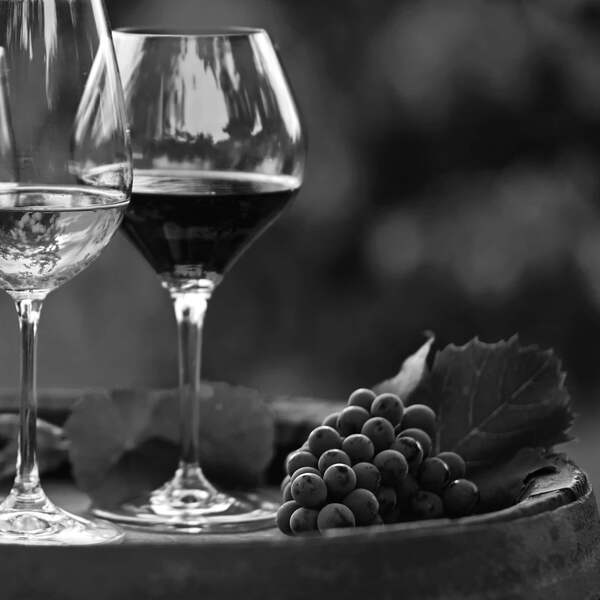 wine glasses on a barrel