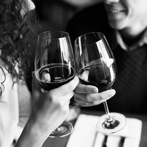 couple with wine glasses