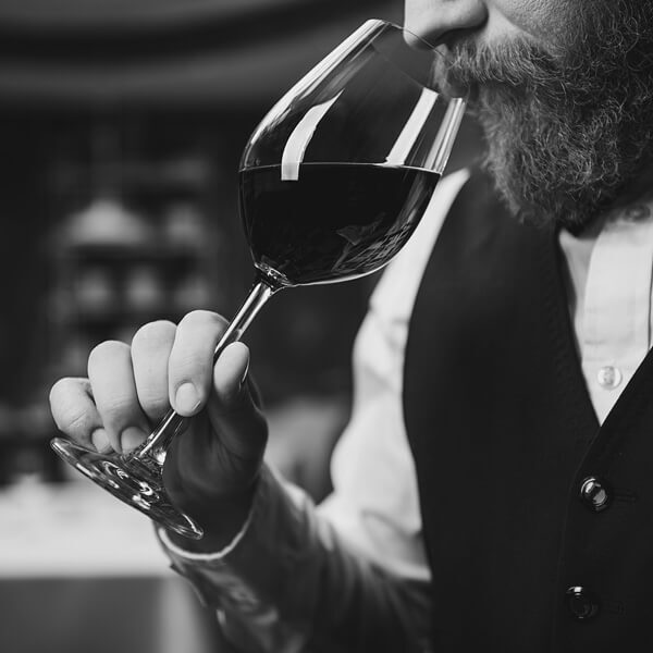 expert smelling wine